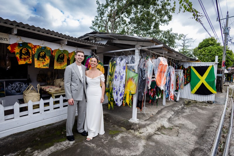 Wedding couple in the colourful streets of Negril, Jamaica