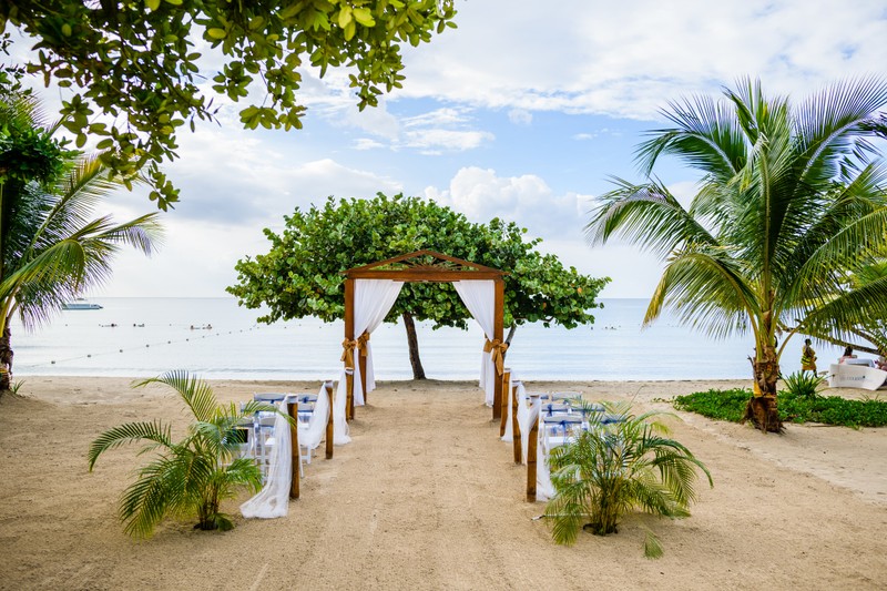 Golden hour sunset over the Caribbean Sea from the cliffs of Negril, Jamaica