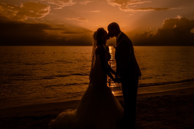 One Kiss at Sunset: A Negril Wedding Photograph