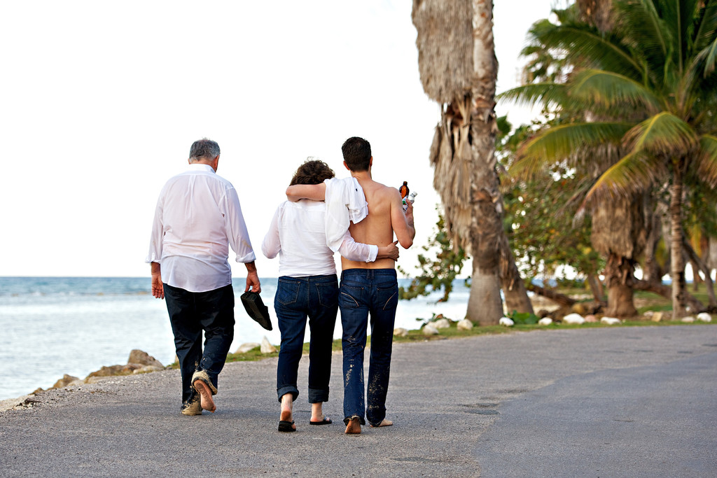 mom hugs son while walking