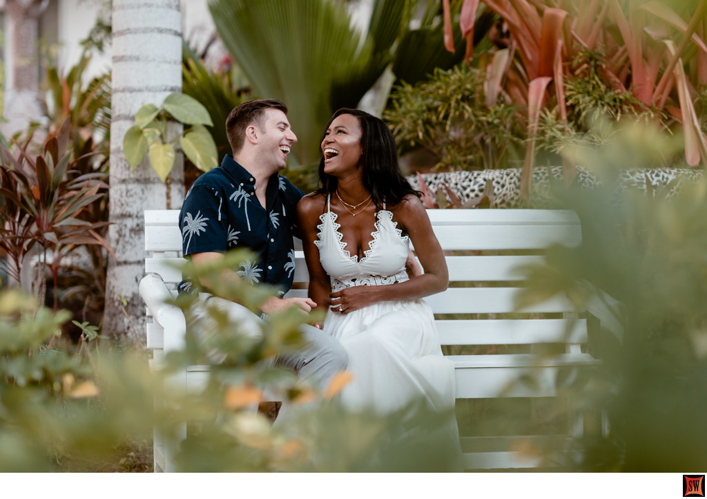 engaged couple giggle at each other Montego Bay Jamaica