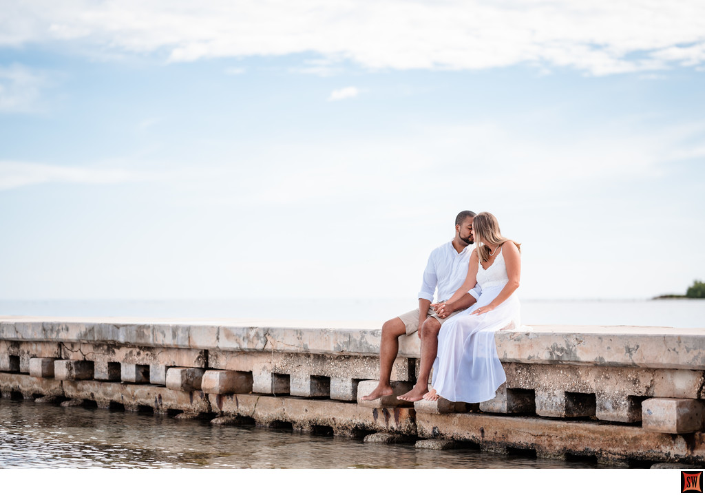 sitting on the pier at Tropical Beach, Montego Bay