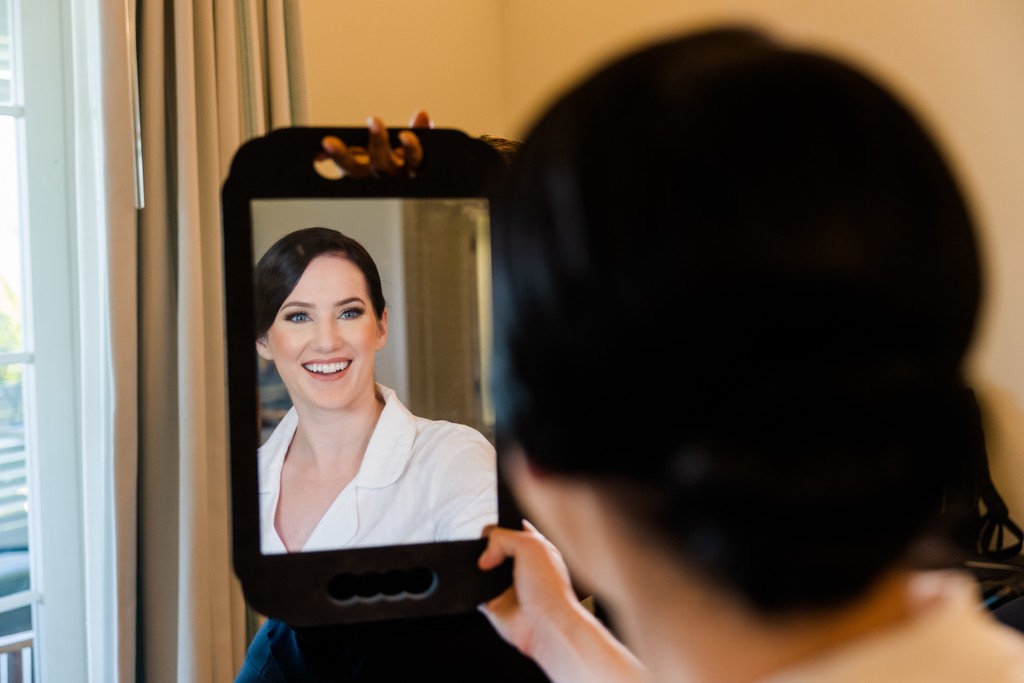 bride face in small mirror