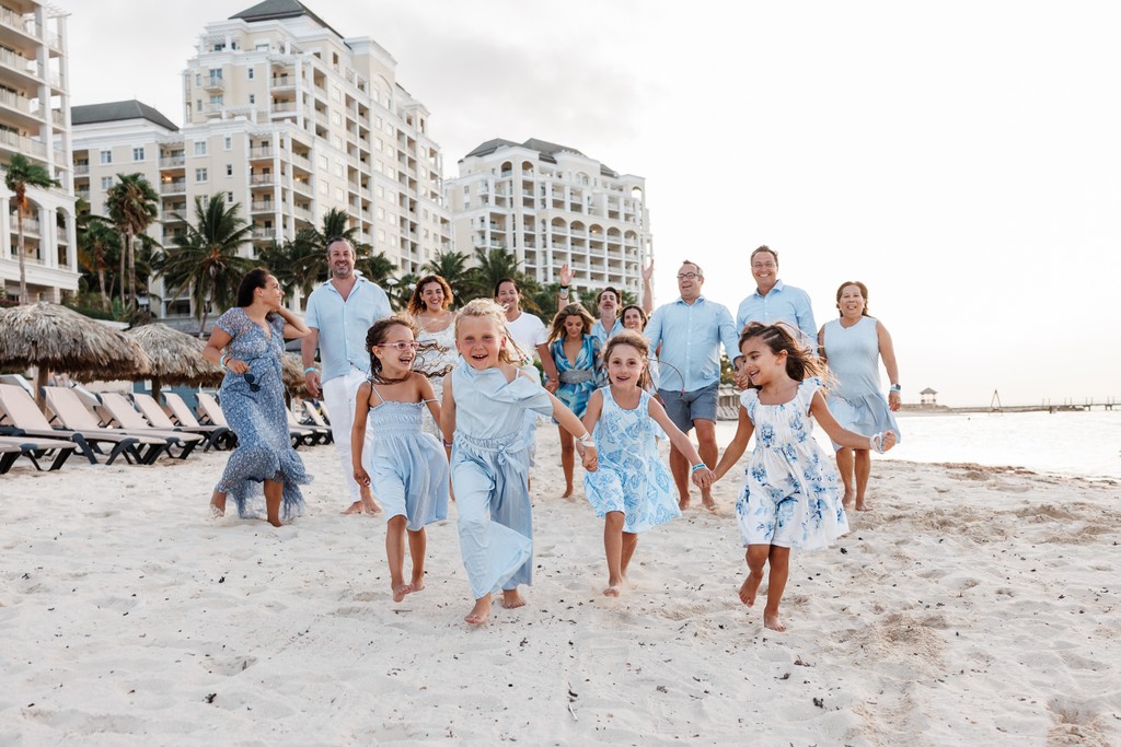 Joyful Family Moments on the Beach at Jewel Grande