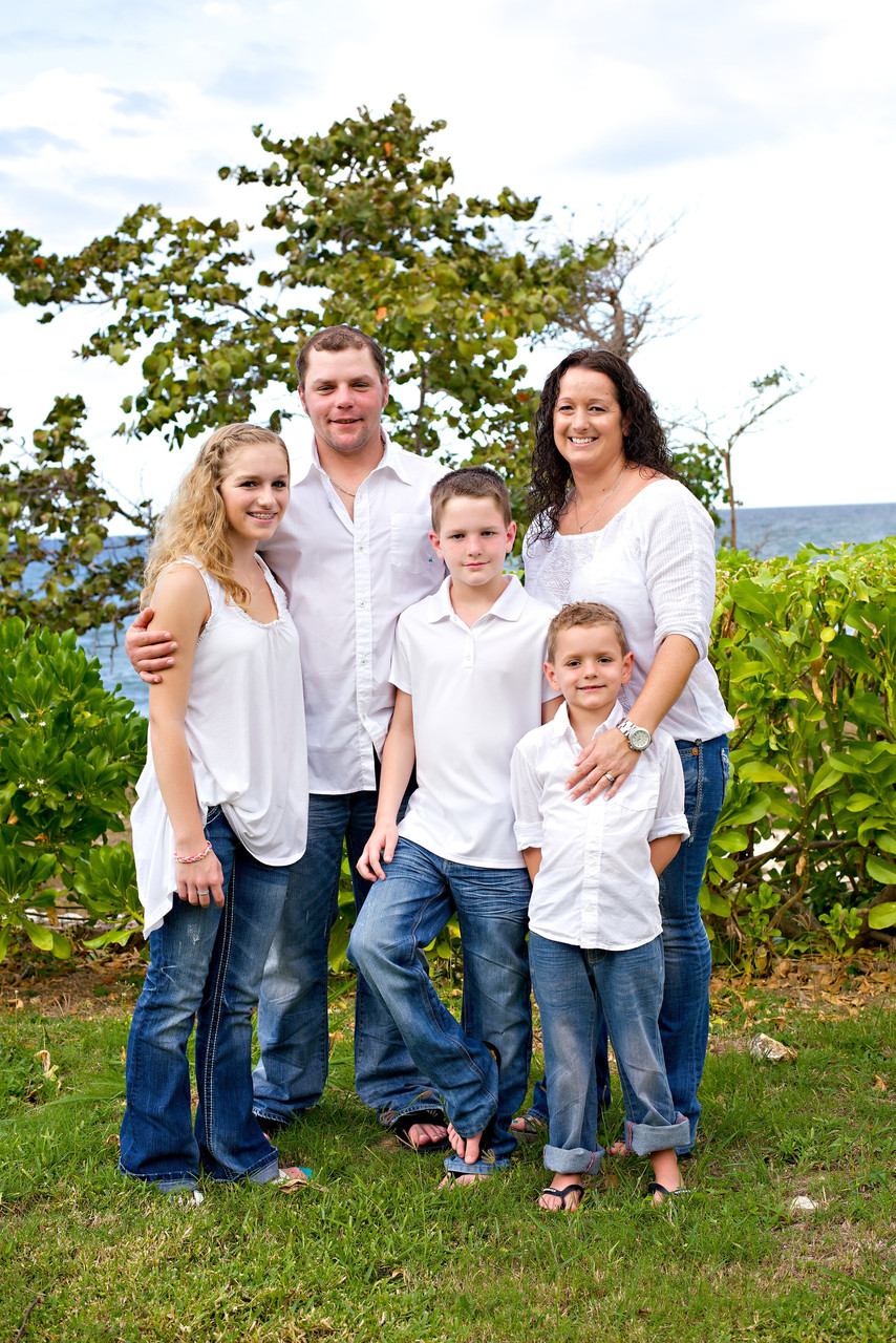 family photo of five in blue and white