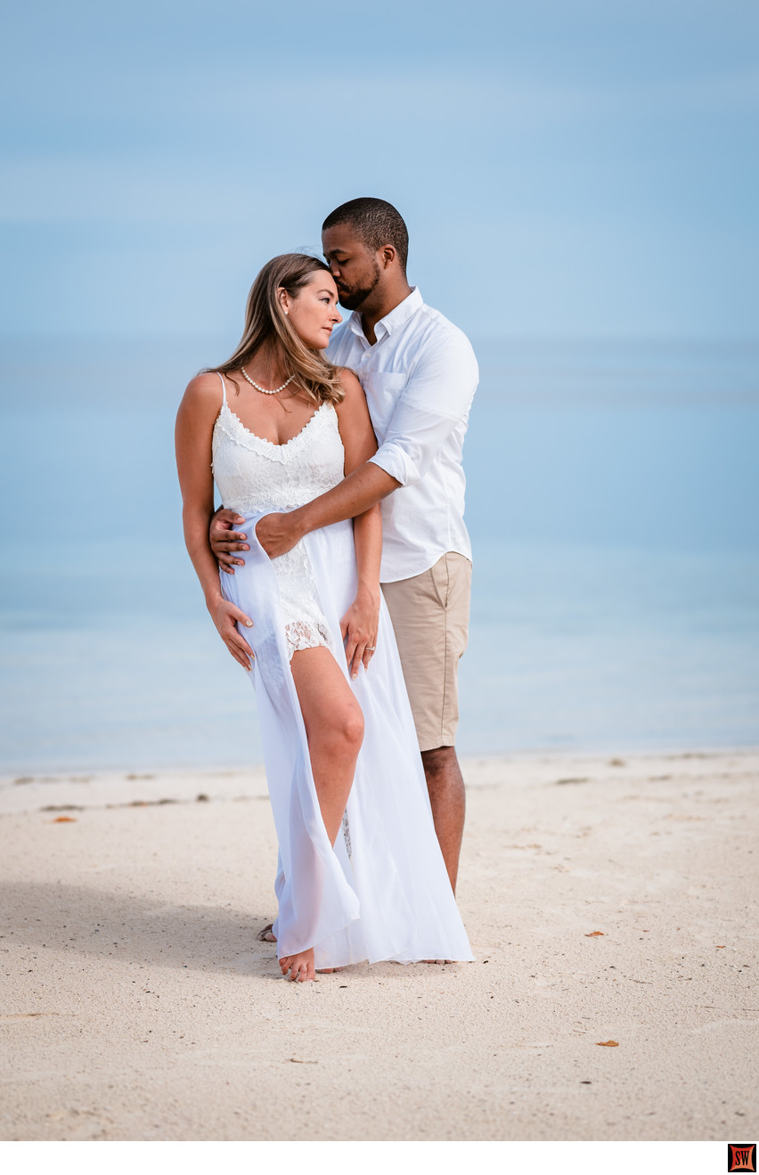 lovey-dovey beach engagement photo
