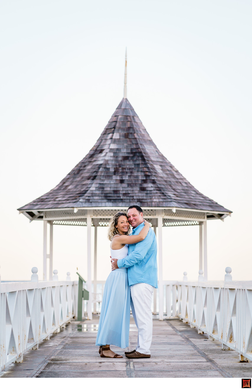 sunset gazebo at half moon resort engaged couple