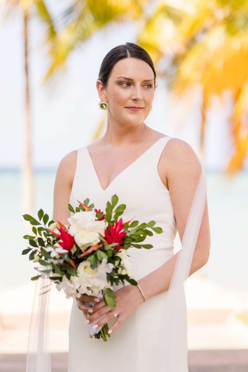 tall bride with tropical floral bouquet 