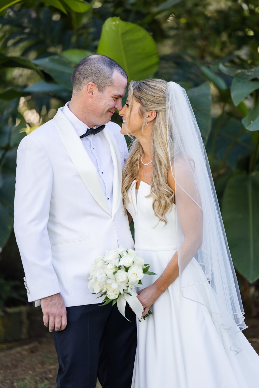 bride and groom touching nose
