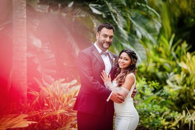 bride and groom holds each other lovingly