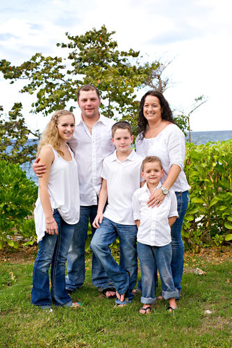 family photo of five in blue and white