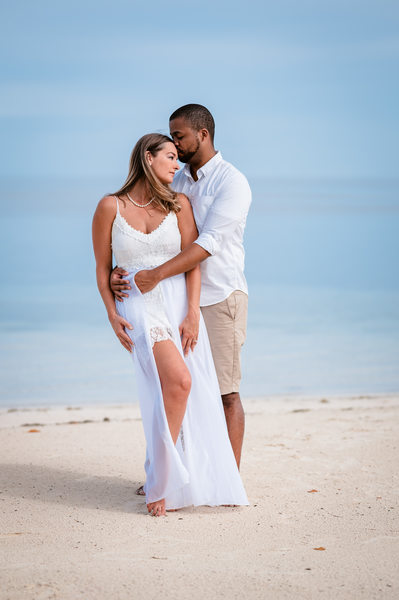lovey-dovey beach engagement photo