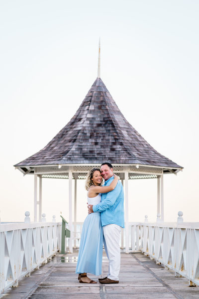 sunset gazebo at half moon resort engaged couple
