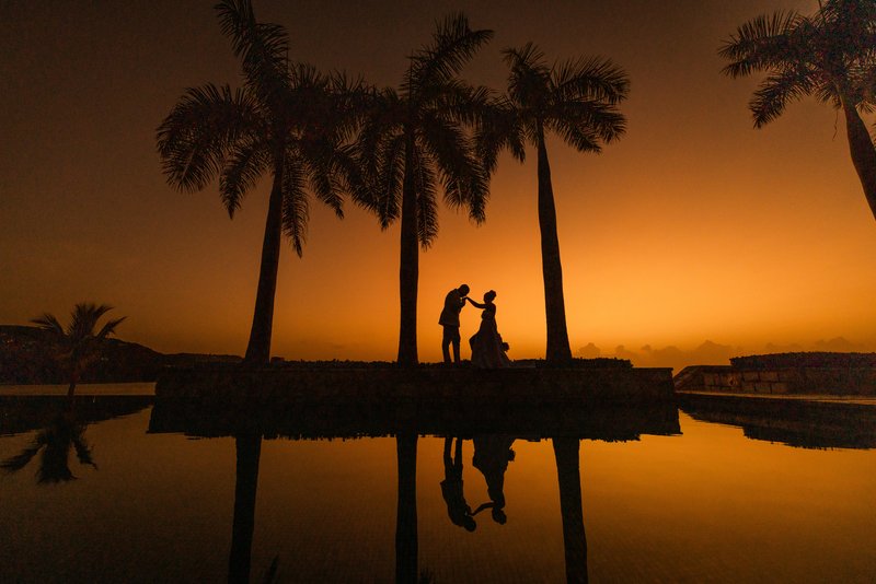 Wedding couple on the beach in Negril, Jamaica, photographed by Michael Saab