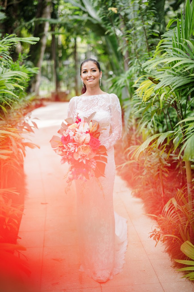 Wedding couple signing marriage documents in Jamaica