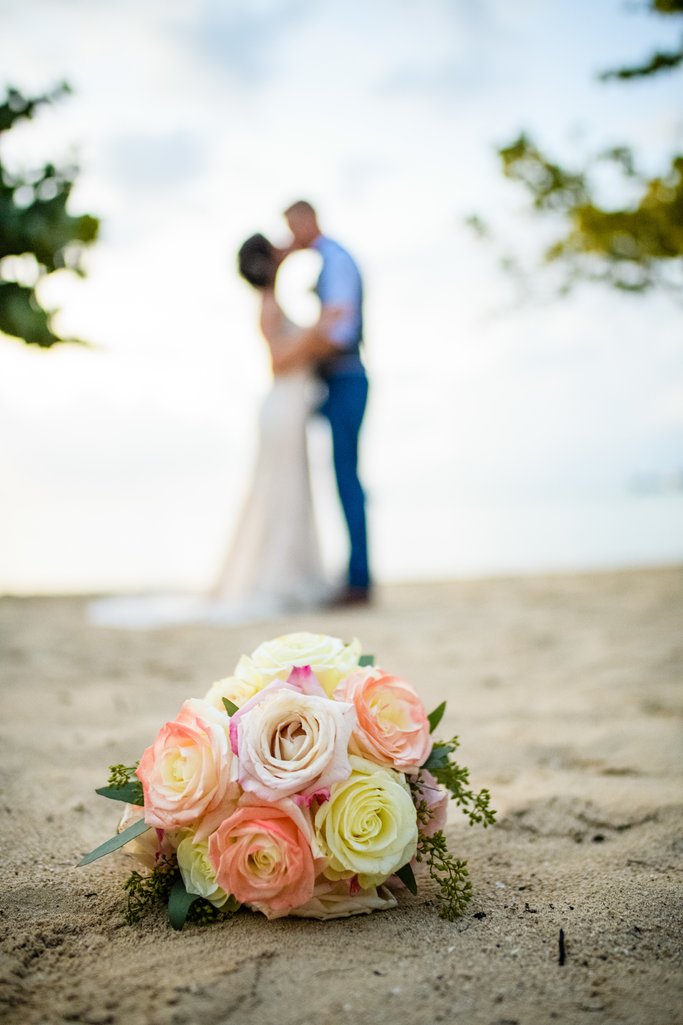 Sunset wedding ceremony on the beach in Negril, Jamaica