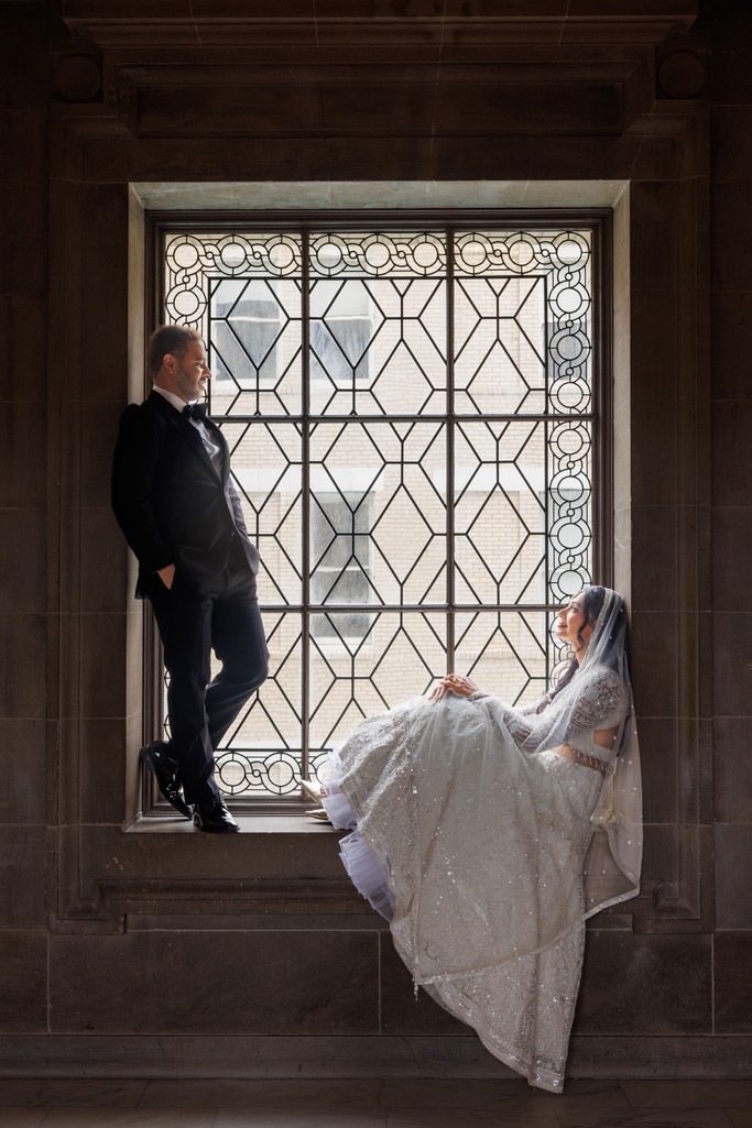 Romantic Bride and Groom Portrait Sitting in a San Francisco City Hall Window