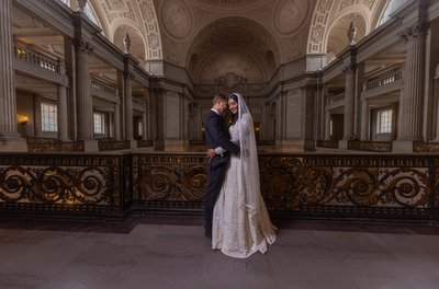 Cinematic Bride and Groom Portrait on the Grand Staircase at San Francisco City Hall
