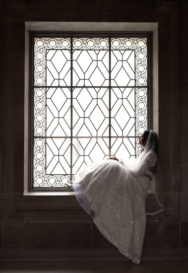 Elegant San Francisco City Hall Bride Sitting in a Grand Window
