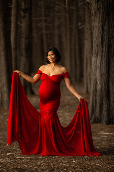 Moss Beach Maternity Photographer – Dramatic Red Dress Forest Portrait Bay Area