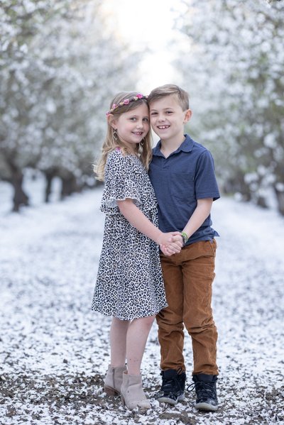 Sibling Hug in Almond Blossoms | Bay Area Almond Blossom Photographer