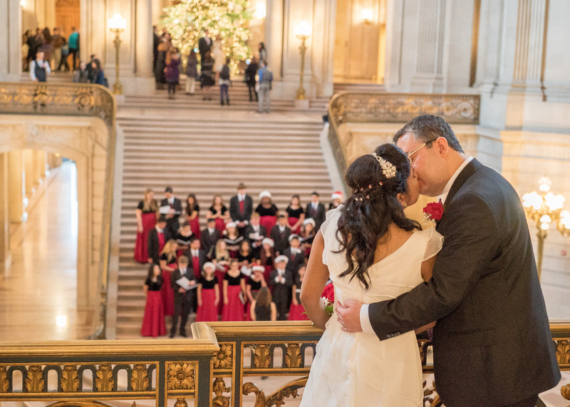 Couple kisses at mayors balcony during Christmas