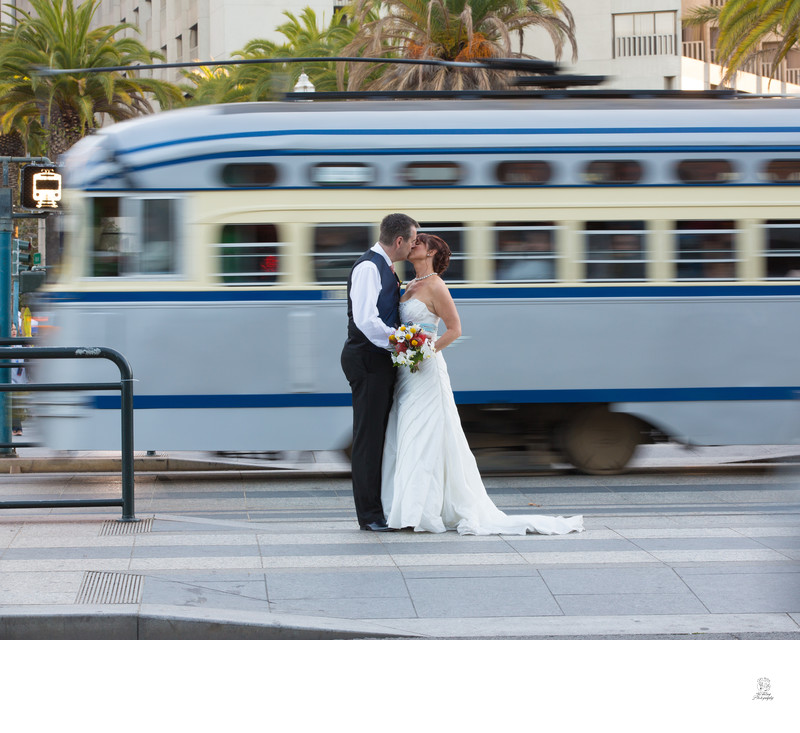 Elopement Kiss by Embarcadero, SF with Cable Car in Motion