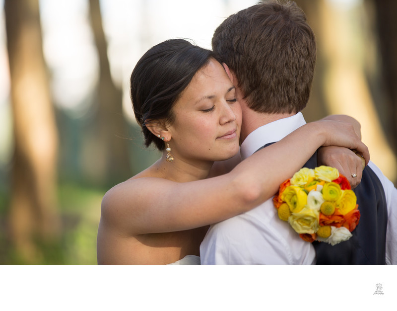 Elopement Bliss: Bride and Groom Embrace in Presidio Woods