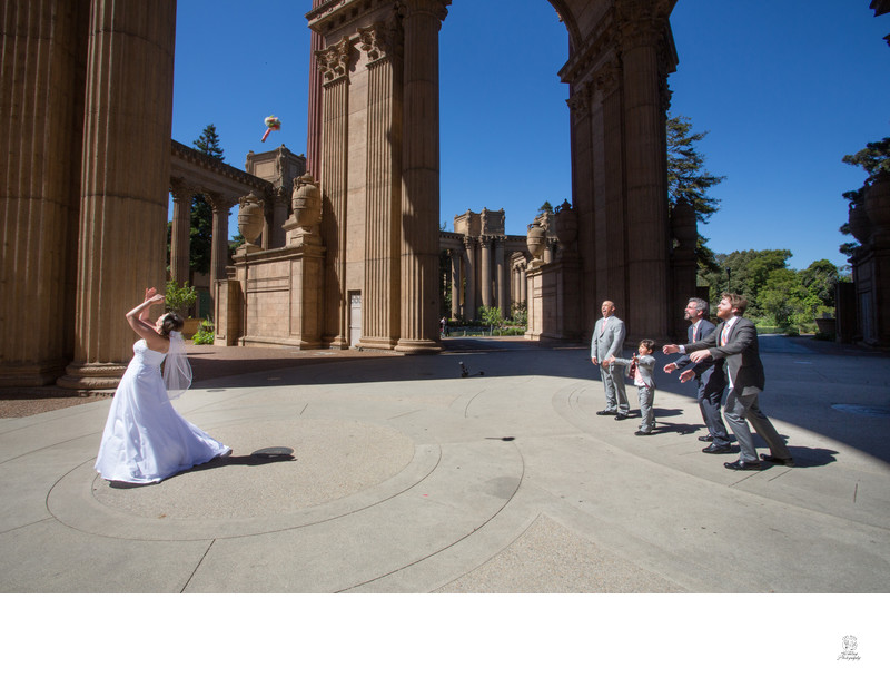 Bride Tossing Bouquet at Palace of Fine Arts