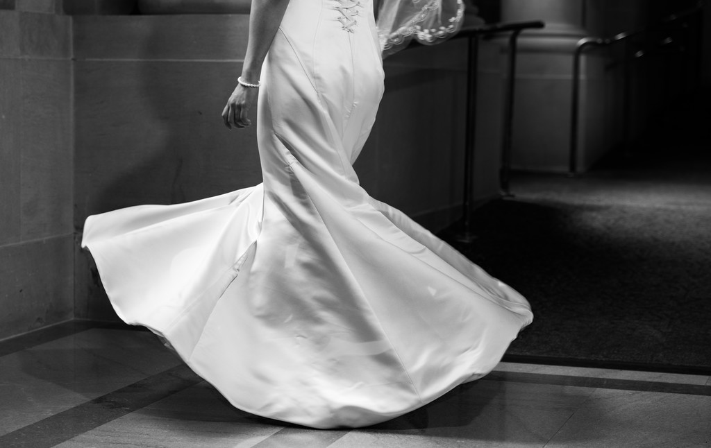 Elegant Bride in Flowing Dress - Black and White Photo