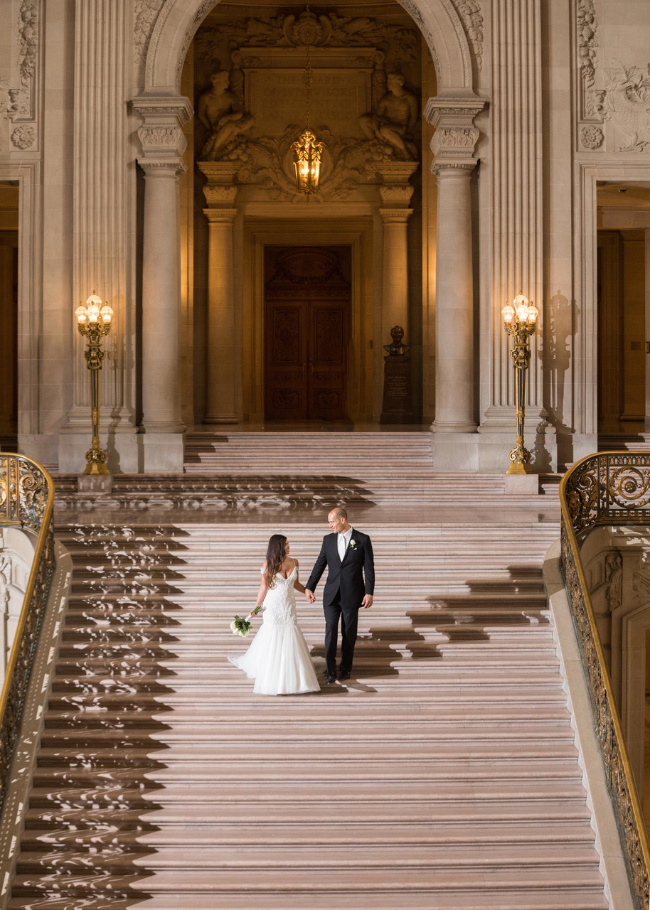  Photo of Couple walking down the Grand Staircase at SF City Hall - Wedding Photography
