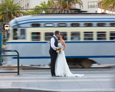 Elopement Kiss by Embarcadero, SF with Cable Car in Motion