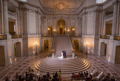 Ceremony in Beautiful Light at a Weekend San Francisco City Hall Wedding - Photography by SF City Hall Wedding Photographer
