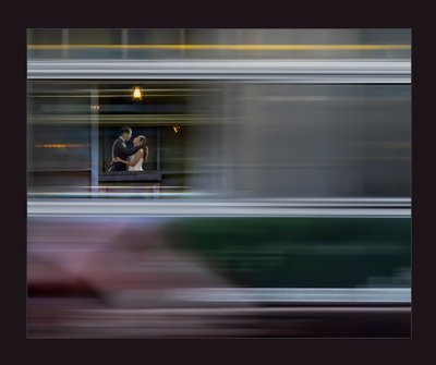 cable car blur couple in embrace