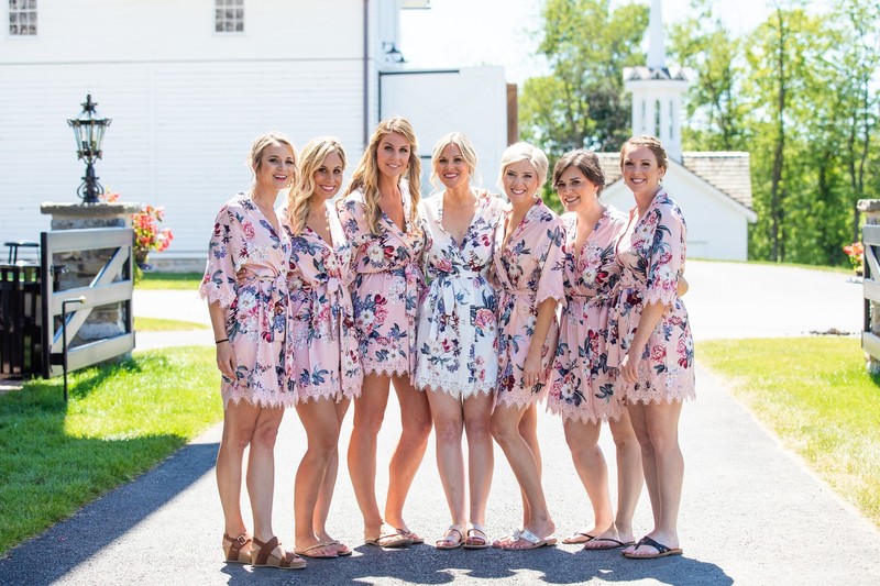 Bride and bridesmaids in wedding getting ready robes