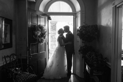 Bride and Groom Kissing at Peter Allen House