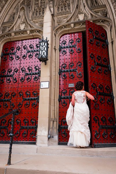 Bride entering Heinz Chapel Red Doors