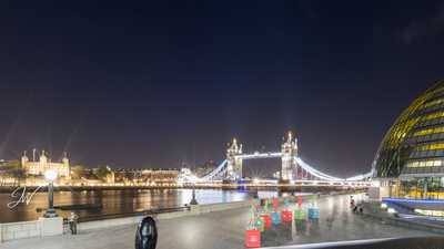 Wide-angle view of Tower Bridge at night
