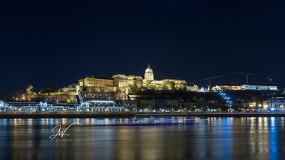 Buda Castle at night from across the Danube. 