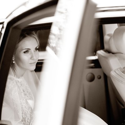 Bride in Wedding car at Claridges, London
