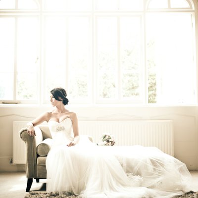 Stylish bridal portrait in natural light take at Nonsuch Manion in Epsom