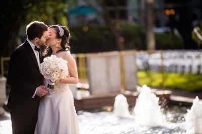 Newlyweds Kiss Outside Logan Philadelphia Hotel