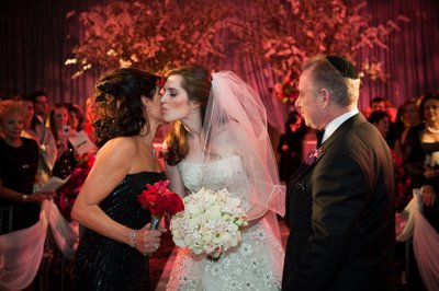 Parents Giving Away Daughter at Jewish Wedding Ceremony