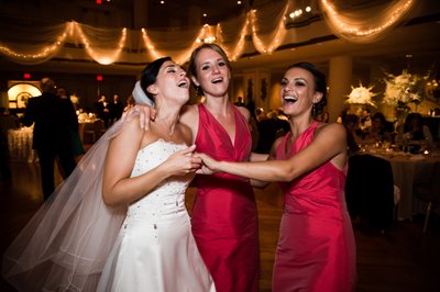Bride and Friends Sing at Wedding Reception
