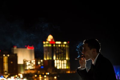 Groom Smoking Cigar at New Jersey Wedding