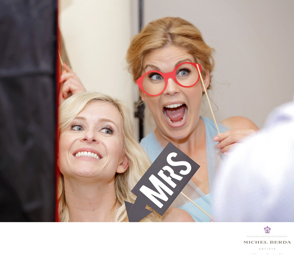 Bride and bridemaid photo booth at Palmetto Hall Wild Dunes Resort