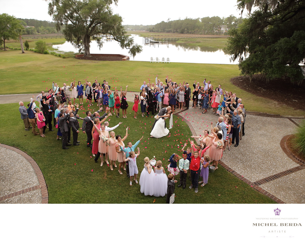 Heart with bride and groom & bridal party family and friends Dunes West Golf & River Club
