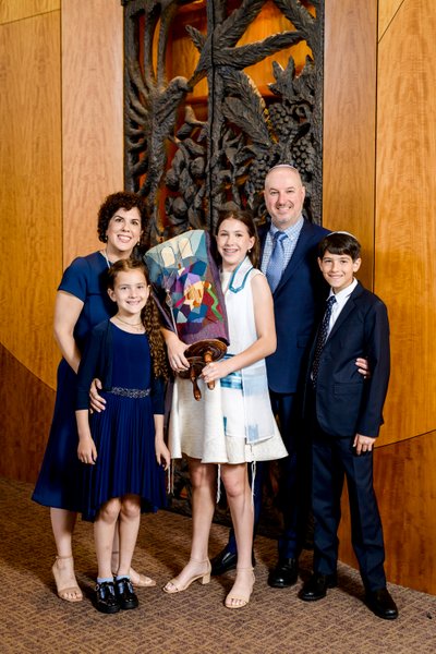 Family Portrait with Torah at Temple Isaiah