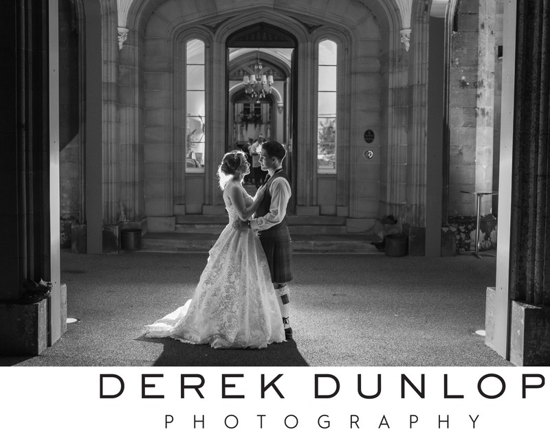 blairquhan-castle-couple-portrait-gothic-archway-evening