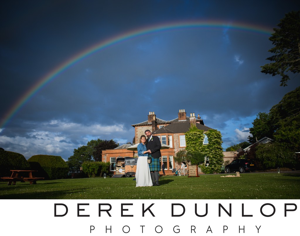 rainbow over Mabie house hotel wedding photo